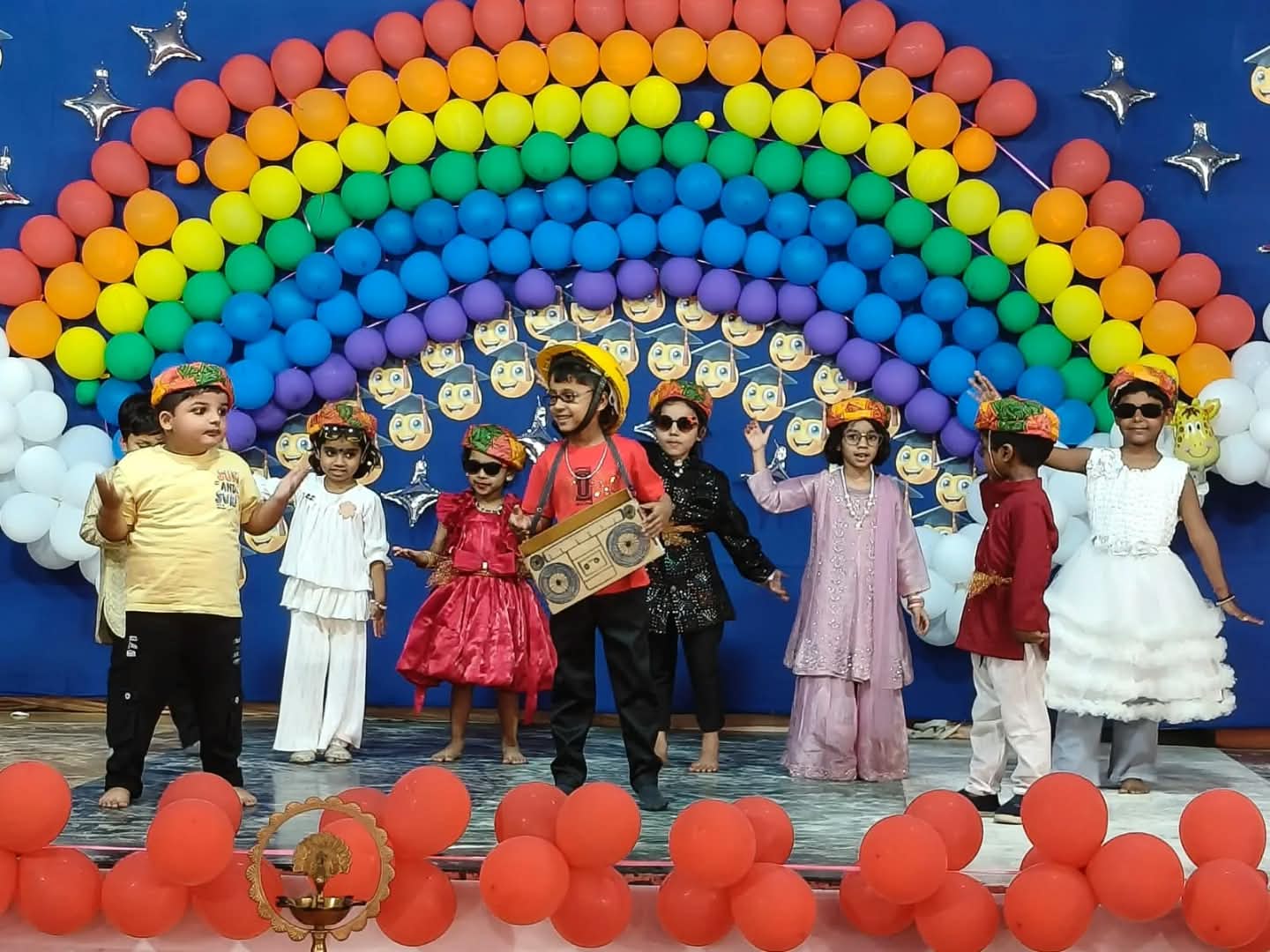 Gurukripa Kids College students performing on stage